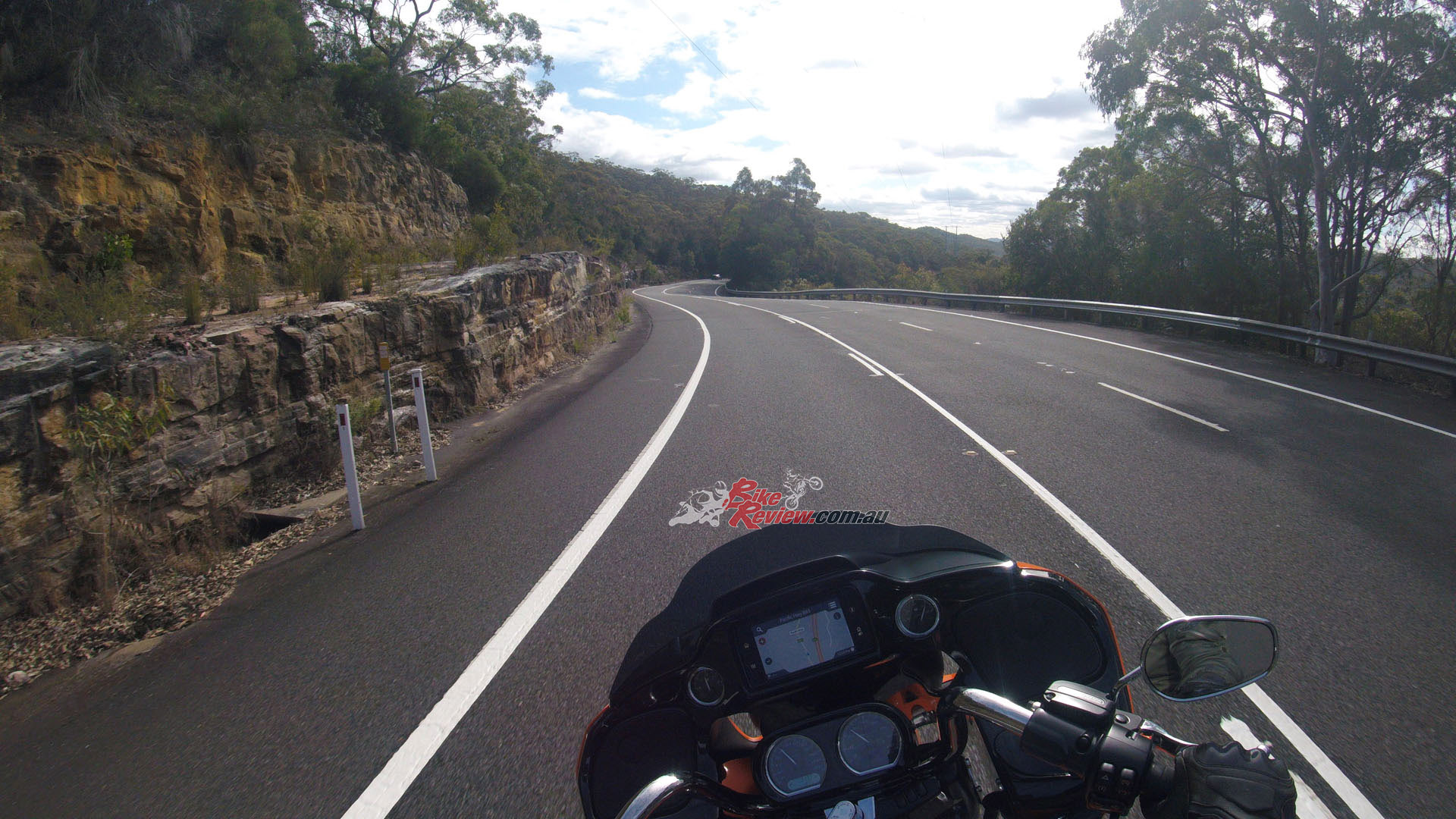 "I began leaning into it more and more and before long I was carrying more corner speed than I had on just about any other HD bar the Sport Glide"...