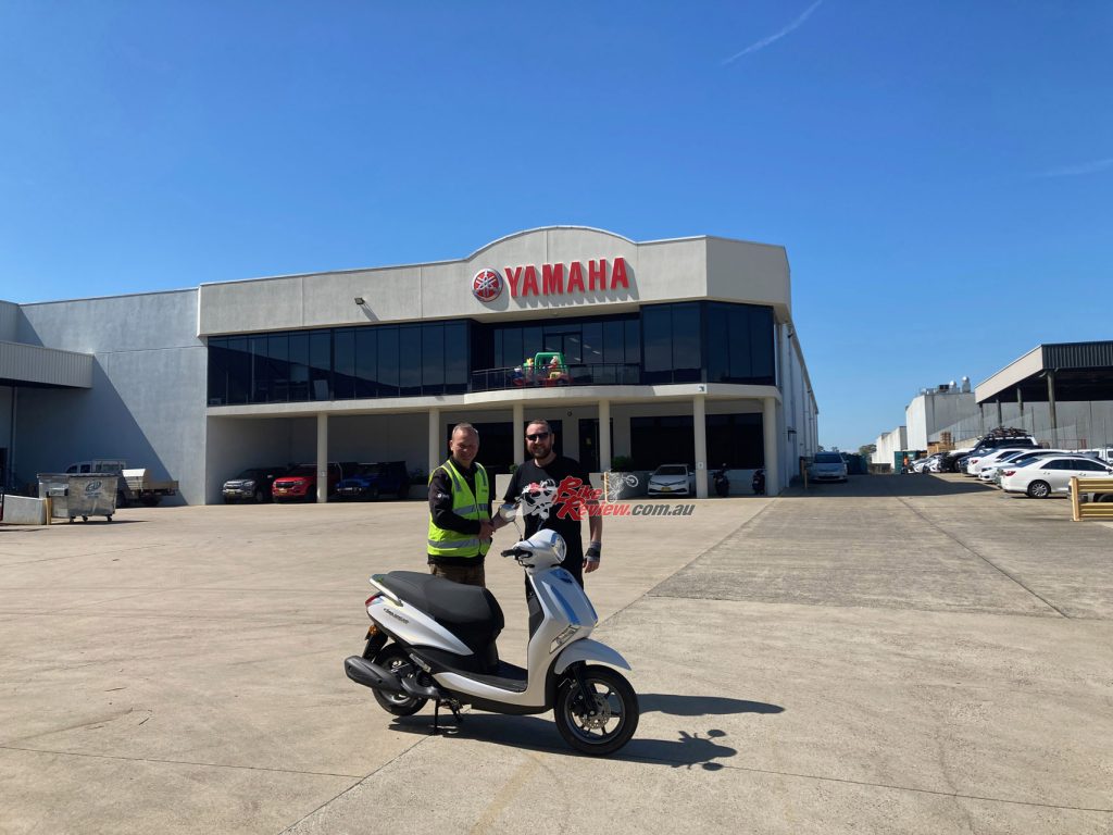Picking the BikeReview D'elight 125 up from Yamaha's Sean Goldhawk.